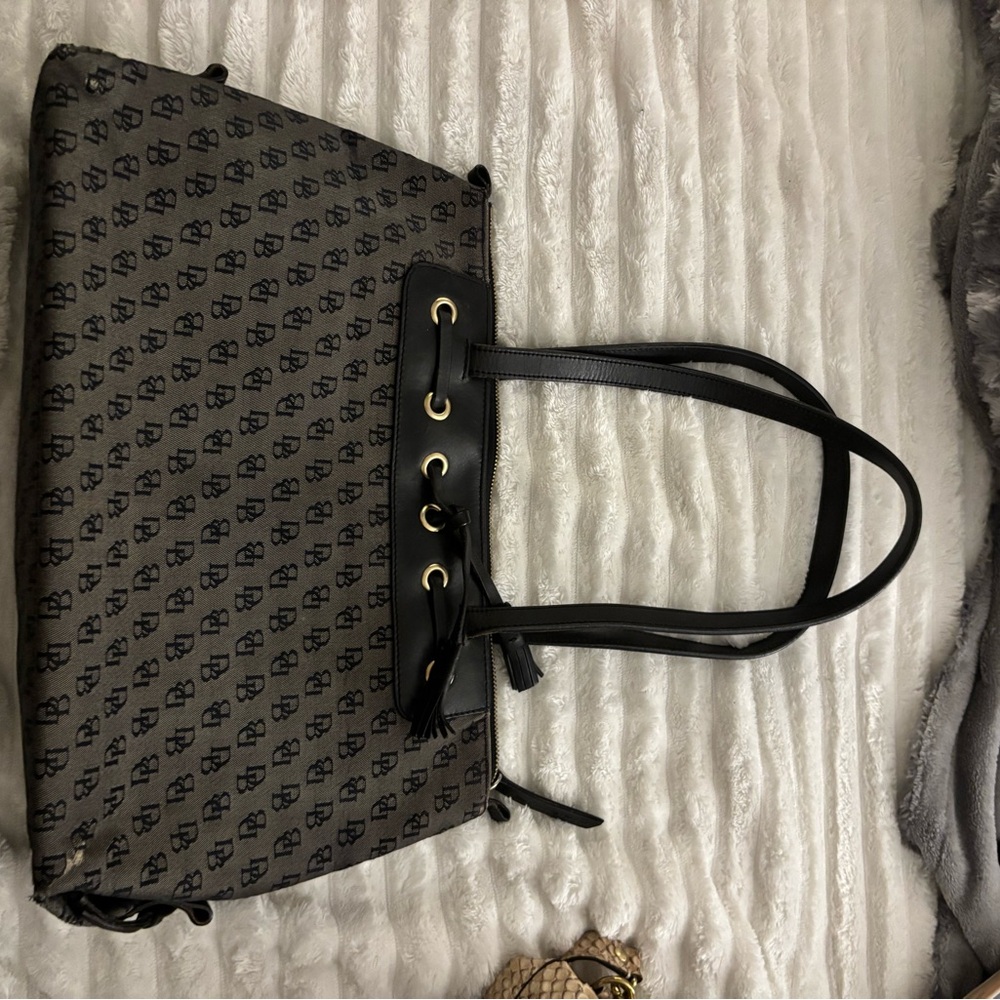 Dooney & Bourke black and gray logo canvas shoulder bag.